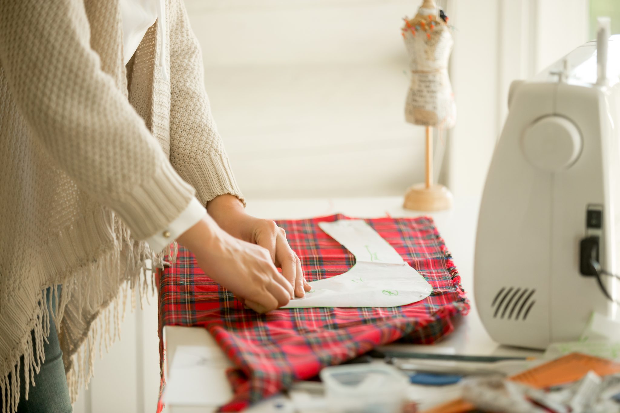 Woman working with a sewing pattern