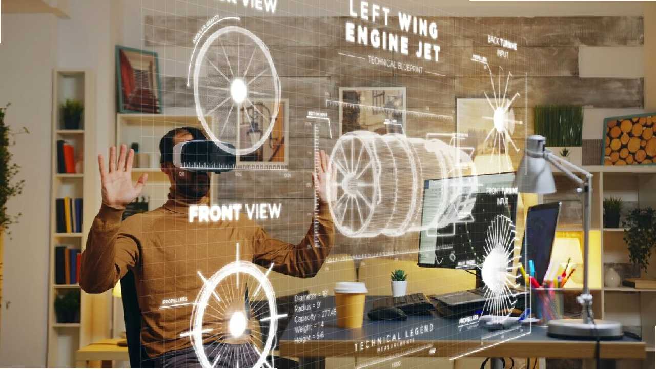 Seorang pria menggunakan Augmented Reality untuk review desain mesin jet pesawat